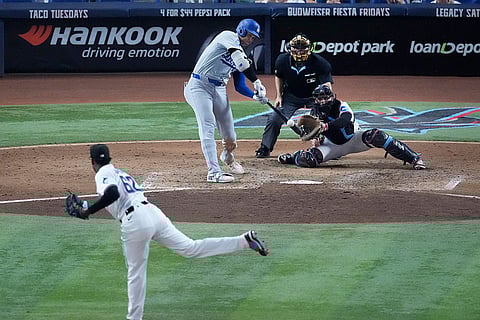 Dodgers vs Marlins Baseball: Los Angeles Dodgers' Shohei Ohtani hits a home run scoring