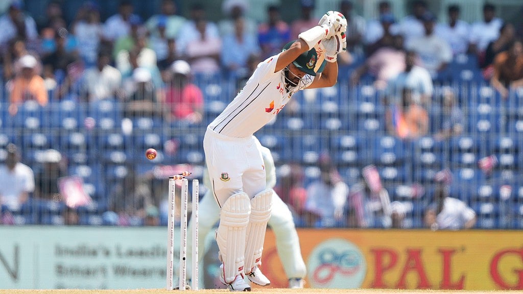 Bangladesh's Shadman Islam bowled out by India's Jasprit Burmrah on the second day of the first cricket test match between India and Bangladesh, in Chennai, India, Friday, Sept.20, 2024. - AP/Mahesh Kumar A.