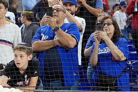 Dodgers vs Marlins Baseball: Los Angeles Dodgers fans take pictures of Shohei Ohtani
