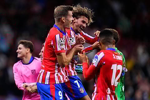 UEFA Champions League, RB Leipzig vs Atletico Madrid: Atletico Madrid's Antoine Griezmann, center, with teammates at the end of the match