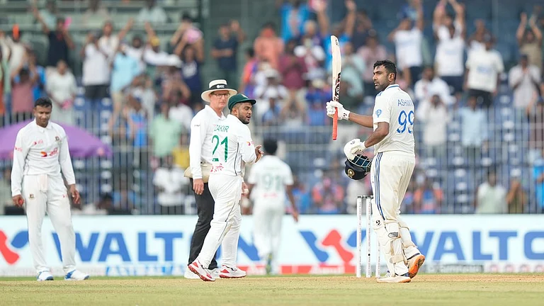 India's Ravichandran Ashwin celebrates after scoring a century on the first day of the first cricket test match between India and Bangladesh, in Chennai, India, Thursday, Sept.19, 2024. - AP/Mahesh Kumar A.