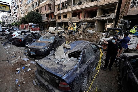 Lebanon Mideast Tensions: Damaged cars at the site of Friday's Israeli strike