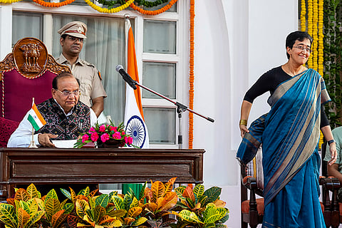 Delhi Lt. Governor V.K. Saxena and CM-designate Atishi