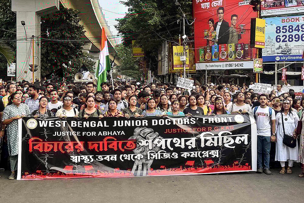 | Photo: PTI : Kolkata Rape Case: Junior doctors during a rally to CBI office