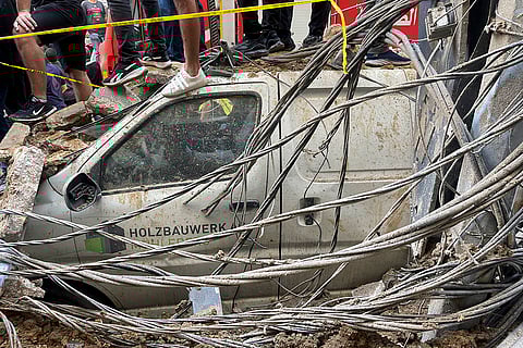 Lebanon Mideast Tensions: A damaged car at the scene of a missile strike