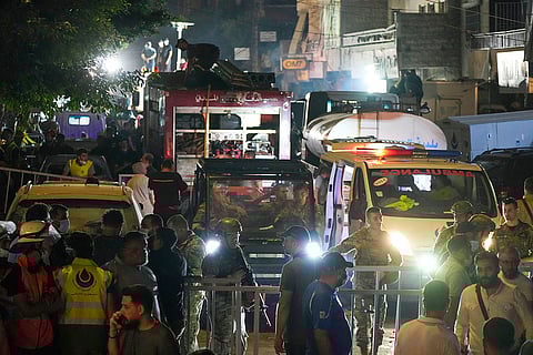 Lebanon Mideast Tensions: Rescuers work after an Israeli missile strike in Beirut