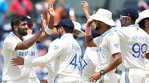 AP : India's Jasprit Bumrah, left, celebrates with teammates a wicket in the first IND vs BAN Test at Chennai.