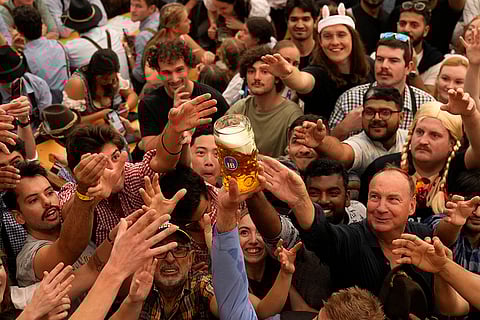 Oktoberfest Opening: Festival goers during day one of the 189th 'Oktoberfest' beer festival in Munich