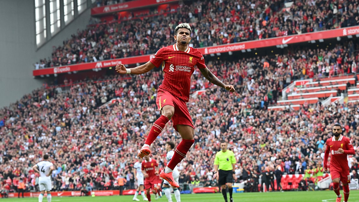Luis Diaz scored twice to send Liverpool top of the Premier League standings