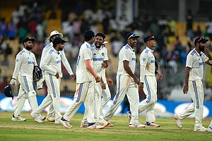 | Photo: AP/Mahesh Kumar A. : IND Vs BAN, 1st Test Day 3: Indian cricketers walk back to the pavilion after bad light stopped play