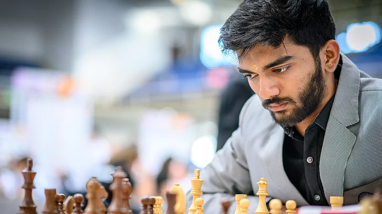 Indian Grandmaster D Gukesh beat America's Fabiano Caruana in round 10 of the FIDE Chess Olympiad 2024 in Budapest. - FIDE/Michał Walusza