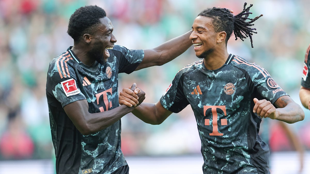 Michael Olise celebrates with Alphonso Davies after scoring on Saturday