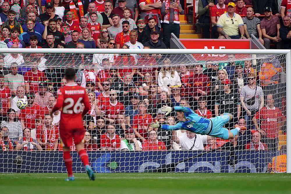 Photo: Peter Byrne/PA via AP : EPL: LFC Vs BOU