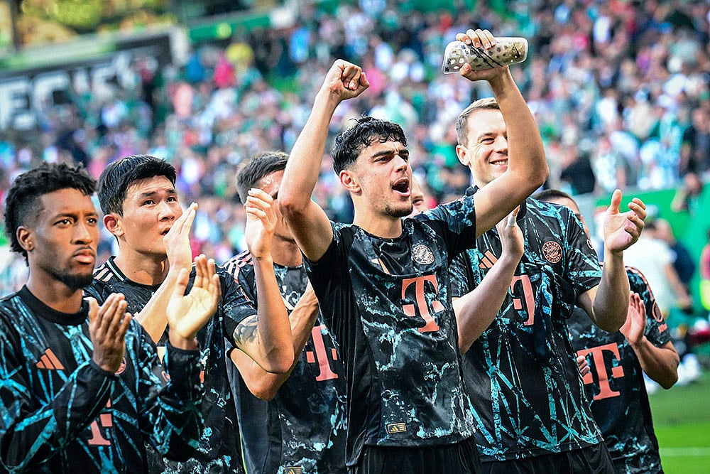Photo: Sina Schuldt/DPA via AP : Bundesliga: Werder Bremen vs Bayern Munich