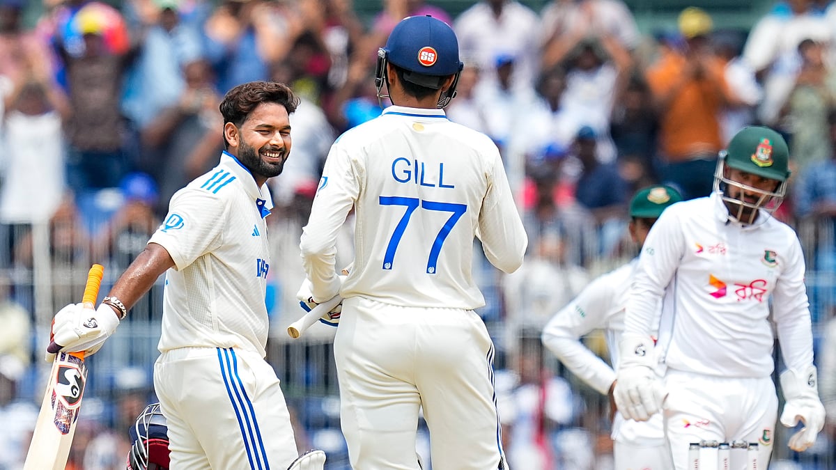 India's Rishabh Pant celebrates his century with Shubman Gill on the third day of the first test cricket match between India and Bangladesh in Chennai. - PTI Photo/R Senthilkumar