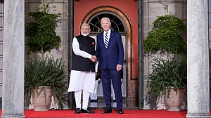 | Photo: AP : President Joe Biden greets India's Prime Minister Narendra Modi at the Quad leaders summit at Archmere Academy in Claymont, Delaware