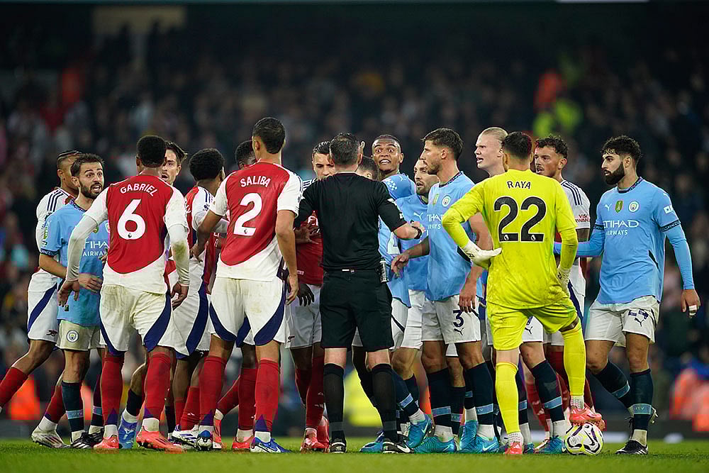 Photo: AP/Dave Thompson : English Premier League Soccer Match: Arsenal vs Manchester City