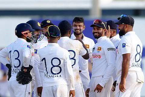Sri Lanka vs New Zealand 1st Test: Sri Lanka's Ramesh Mendis, center, celebrates with teammates the wicket of New Zealand's captain Tim Southee