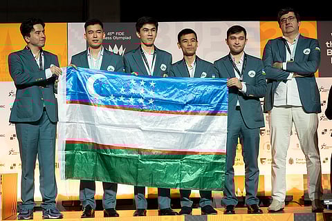 Chess Olympiad 2024: Third place of Open category team Uzbekistan pose during a victory ceremony