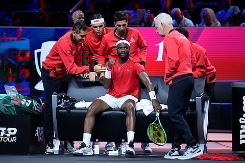Laver Cup 2024, Team Europe vs Team World: Team World's captain John McEnroe, standing right, speaks to Team World's Frances Tiafoe