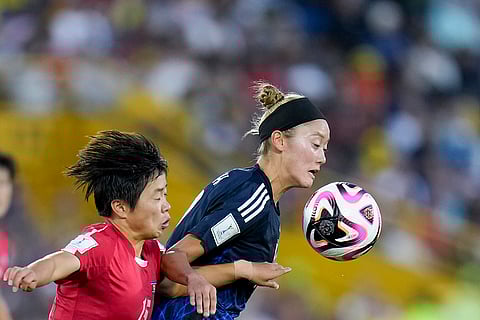 U-20 Women's World Cup, North Korean vs Japan: Japan's Chinari Sasai, right, and North Korea's Choe Il Son battle for the ball