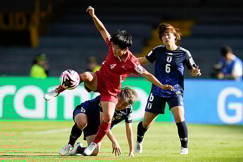 U-20 Women's World Cup, North Korean vs Japan: North Korea's Sin Hyang, left, and Japan's Hiromi Yoneda battle for the ball