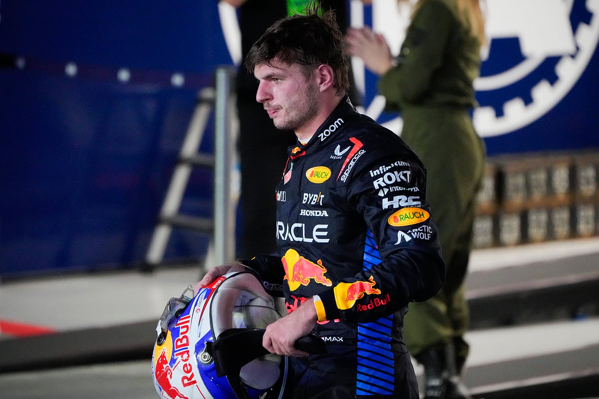  (AP Photo/Vincent Thian) : Red Bull driver Max Verstappen of the Netherlands reacts after his second place finish in the Singapore Formula One Grand Prix at the Marina Bay Street Circuit, in Singapore, Sunday, Sept. 22, 2024.