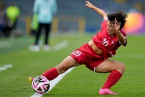 U-20 Women's World Cup, North Korean vs Japan: North Korea's Chae Un Yong controls the ball