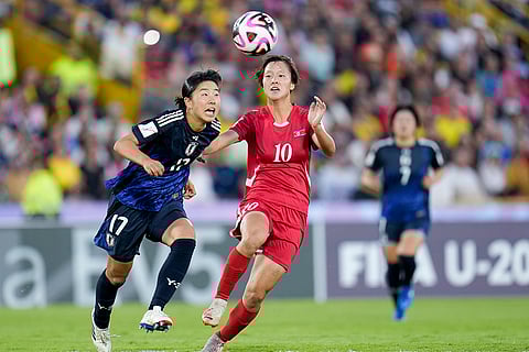 U-20 Women's World Cup, North Korean vs Japan: Japan's Uno Shiragaki, left, and North Korea's Pak Mi Ryong battle for the ball
