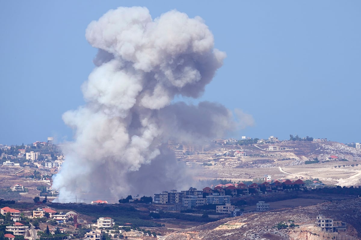 AP : Smoke rises from Israeli airstrikes on villages in the Nabatiyeh district, seen from the southern town of Marjayoun, Lebanon, Monday, Sept. 23, 2024