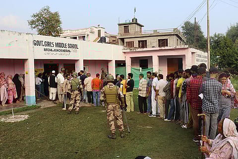 J&K Assembly elections, 2nd Phase voting: People wait to cast their votes at a polling station in Poonch district