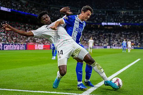 La Liga 2024-25, Real Madrid vs Alaves: Aurelien Tchouameni, front, duels for the ball with Alaves' Ander Guevara