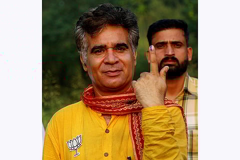 J&K Assembly elections, 2nd Phase voting: J&K BJP President Ravinder Raina shows his inked finger