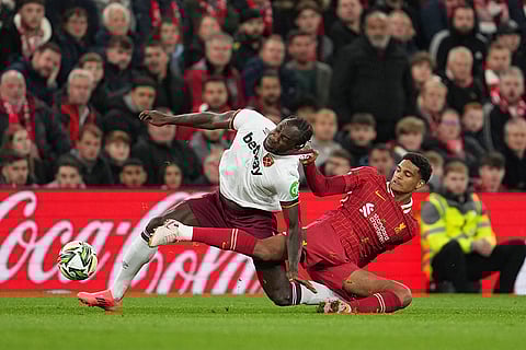 EFL Cup, Liverpool vs West Ham: Liverpool's Jarell Quansah,right, fouls West Ham's Michail Antonio
