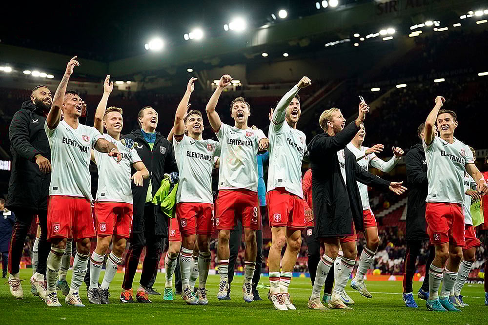 | Photo: AP/Dave Thompson : UEFA Europa League, Manchester United vs Twente: Twente players celebrate after the Europa League match