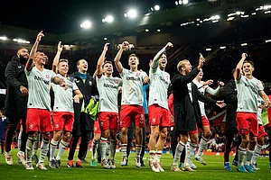 | Photo: AP/Dave Thompson : UEFA Europa League, Manchester United vs Twente: Twente players celebrate after the Europa League match