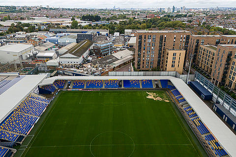 Britain Weather: An aerial view of the sinkhole on the pitch at the Cherry Red Records Stadium