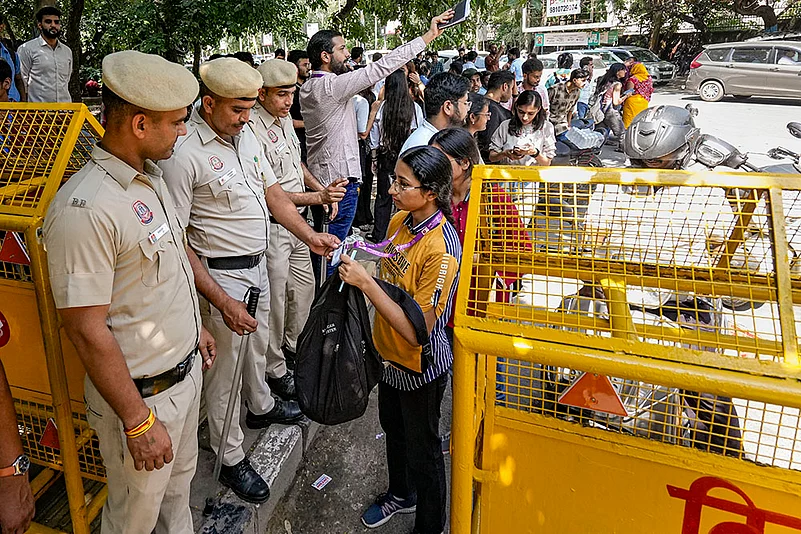 DU Students Union polls 2024 Police personnel check identity cards of voters