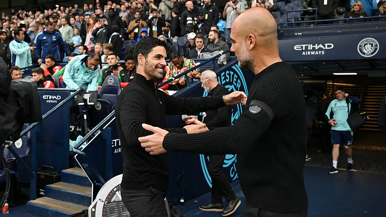 Mikel Arteta and Pep Guardiola - null