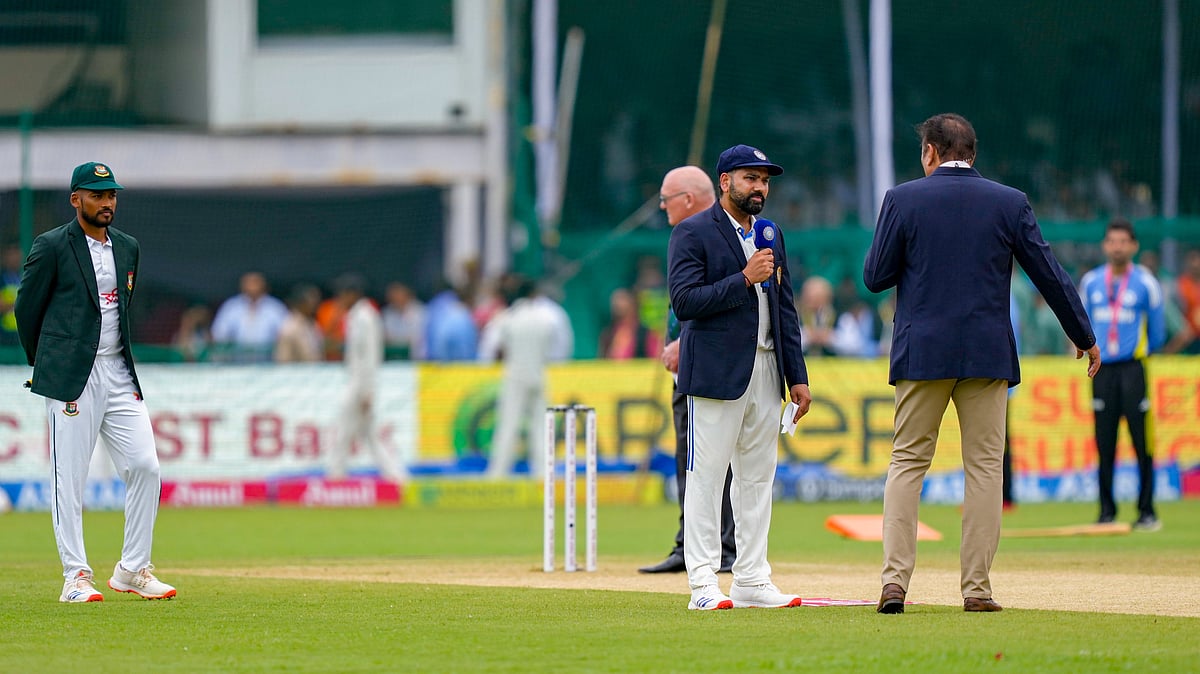 Indian skipper Rohit Sharma and Bangladesh captain Najmul Hossain Shanto at the toss before the start of the 2nd cricket Test match between India and Bangladesh at the Green Park Stadium, in Kanpur. - PTI Photo/Vijay Verma