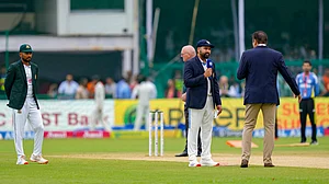 PTI Photo/Vijay Verma : Indian skipper Rohit Sharma and Bangladesh captain Najmul Hossain Shanto at the toss before the start of the 2nd cricket Test match between India and Bangladesh at the Green Park Stadium, in Kanpur.