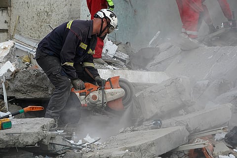 Russia Ukraine War: Emergency workers try to shift the rubble and debris in Kharkiv