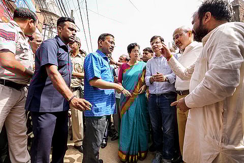Atishi and Kejriwal inspect road in Delhi