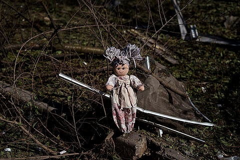 Russia Ukraine War: A doll lies on the ground near a residential building in Mykolaivka, Donetsk region