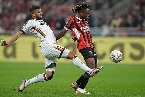 Serie A 2024-25, AC Milan vs Lecce: Lecce's Hamza Rafia clears the ball in front of AC Milan's Samuel Chukwueze