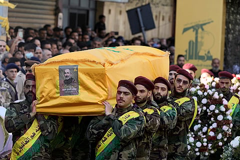 Israel-Hezbollah War: Hezbollah members carry the coffin of Hezbollah drone commander, Mohammed Hussein Surour