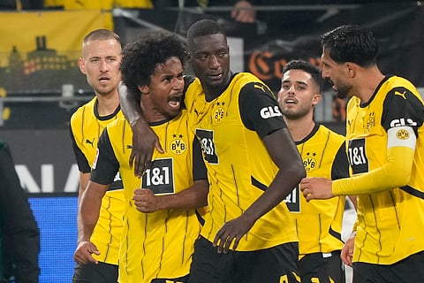 German Bundesliga 2024-25, Borussia Dortmund vs VfL Bochum: Dortmund's scorer Serhou Guirassy, center, celebrates after he scored his side's third goal