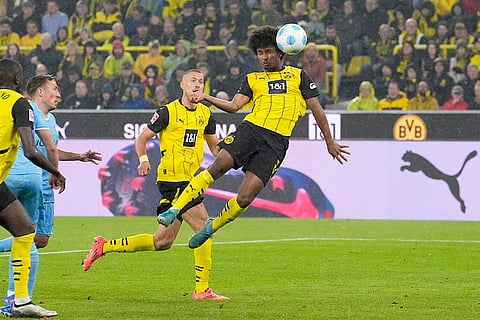 German Bundesliga 2024-25, Borussia Dortmund vs VfL Bochum: Dortmund's Karim Adeyemi heads the ball