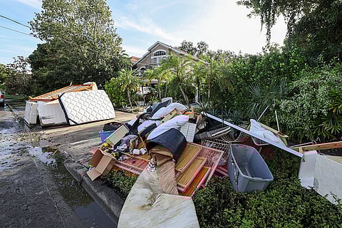 Hurricane Helene: Residents continue to clean our from flooding