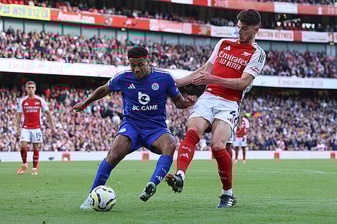 English Premier League 2024-25, Arsenal vs Leicester City: Arsenal's Declan Rice, right, challenges for the ball with Leicester's James Justin